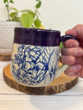 Load image into Gallery viewer, #015 - 16 oz. Blue hydrangea patterned mug with purple rim *see notes