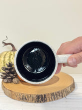 Load image into Gallery viewer, #001 - 16 oz. White speckled mug with Halloween ghost patterns. Black inside. * See notes