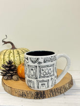 Load image into Gallery viewer, #002 - 16 oz. White speckled mug with Halloween ghost patterns. Black inside. * See notes