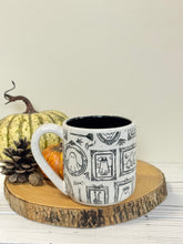 Load image into Gallery viewer, #002 - 16 oz. White speckled mug with Halloween ghost patterns. Black inside. * See notes