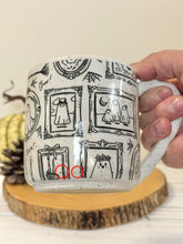 Load image into Gallery viewer, #002 - 16 oz. White speckled mug with Halloween ghost patterns. Black inside. * See notes