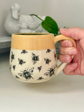 Load image into Gallery viewer, #014 - 16 oz. Bee mug with blue inside and honey rim
