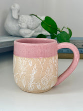 Load image into Gallery viewer, #012 - 18 oz. White floral pattern on bare clay, pink glazed rim and interior
