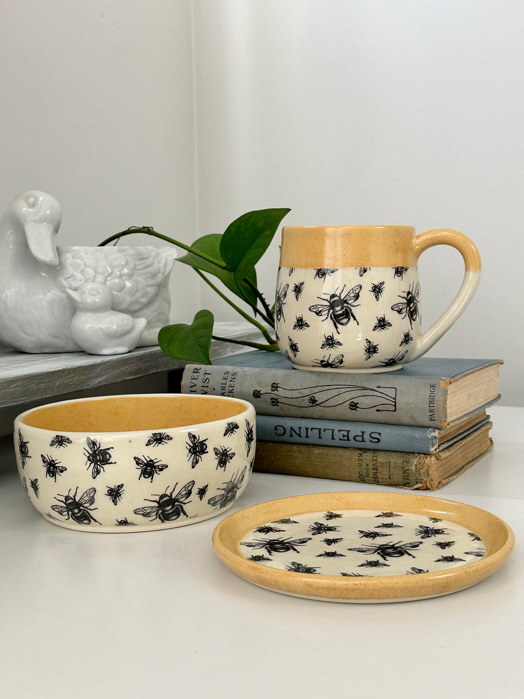 #015 - 3 piece set - Small snack plate, small dessert bowl, and 16 oz. mug with bee pattern and yellow rim. Dark blue inside the mug