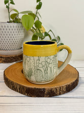 Load image into Gallery viewer, #001 - 16 oz. Green cactus patterned mug with blue inside and yellow rim
