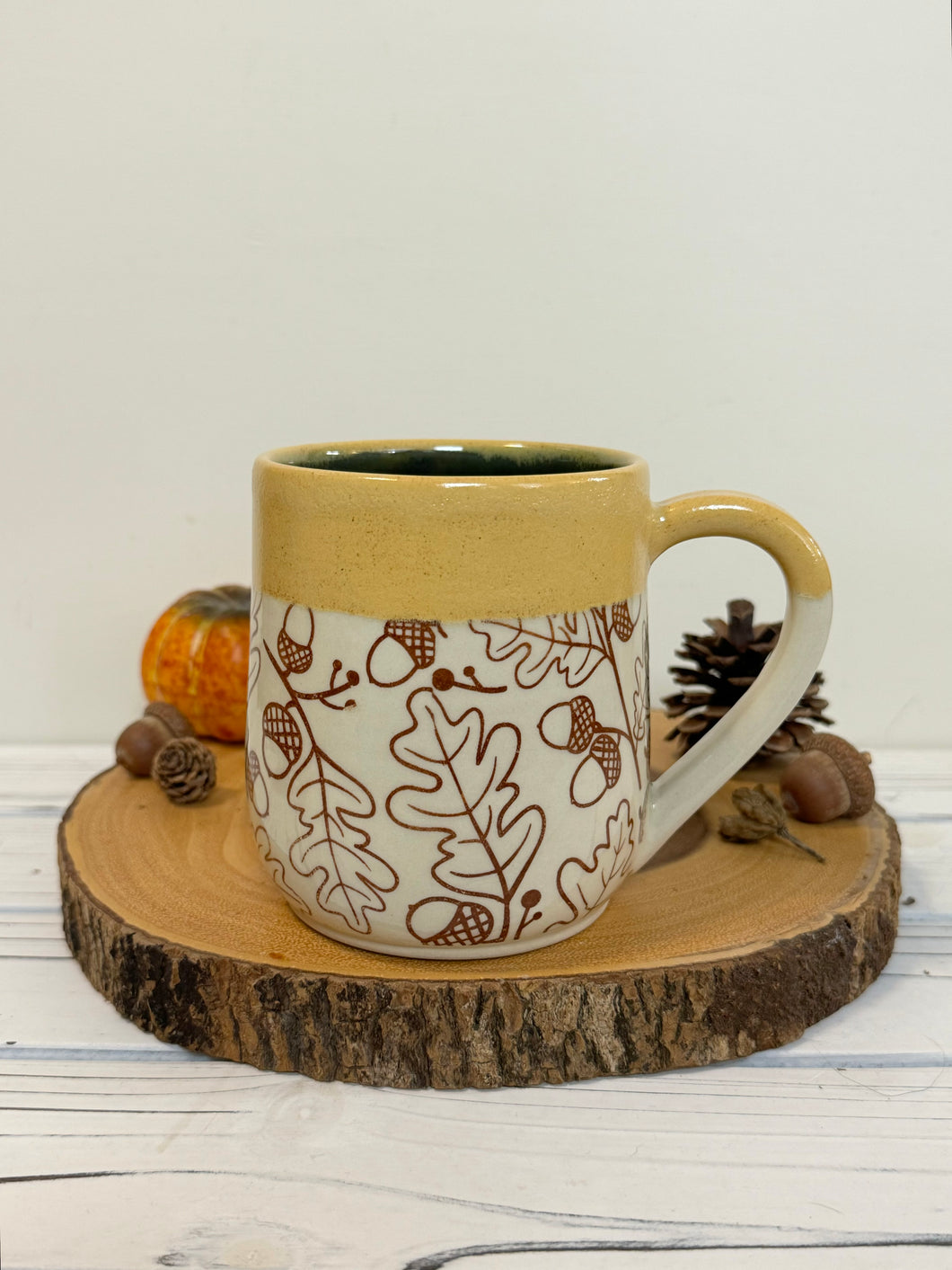 #009 -  16 oz. Brown acorn pattern mug with yellow rim and blue inside