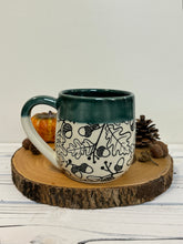 Load image into Gallery viewer, #010 -  18 oz. Black Acorn pattern mug with green rim
