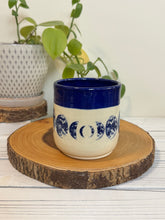 Load image into Gallery viewer, #008 - 16 oz. Blue moon phase patterned mug with cobalt blue rim
