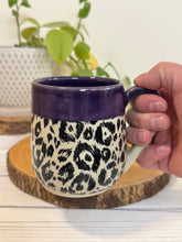 Load image into Gallery viewer, #012 - 16 oz. Leopard patterned mug with purple rim

