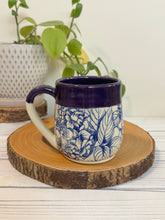 Load image into Gallery viewer, #015 - 16 oz. Blue hydrangea patterned mug with purple rim *see notes
