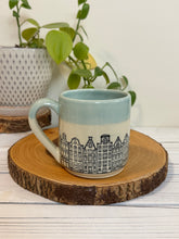 Load image into Gallery viewer, #019 - 16 oz. Amsterdam house patterned mug with aqua rim
