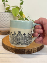 Load image into Gallery viewer, #019 - 16 oz. Amsterdam house patterned mug with aqua rim
