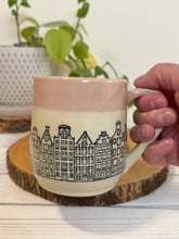 Load image into Gallery viewer, #021 - 16 oz. Amsterdam house patterned mug with pink rim
