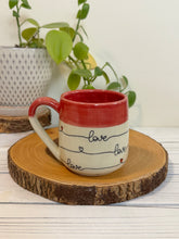 Load image into Gallery viewer, #025 - 14 oz. Love patterned mug with red rim
