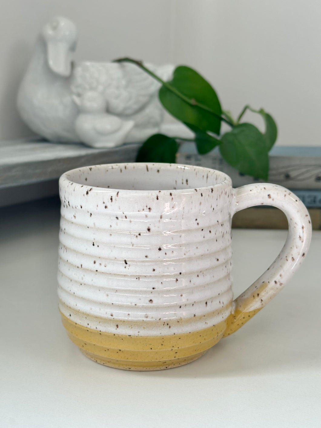 #001 - 16 oz. White and yellow speckled, ridged mug