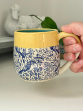 Load image into Gallery viewer, #002 - 14-16 oz. Birds in blue mug with yellow rim and turquoise inside *see notes
