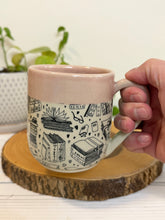 Load image into Gallery viewer, #002 - 16 oz. Book patterned mug with pink rim and inside
