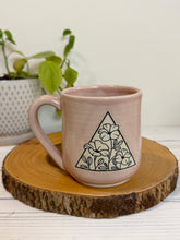 Load image into Gallery viewer, #007 - 16 oz. Pink mug with a flower pattern. Unglazed clay where pattern is
