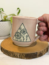 Load image into Gallery viewer, #007 - 16 oz. Pink mug with a flower pattern. Unglazed clay where pattern is
