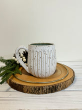 Load image into Gallery viewer, #028 - 14 oz. White speckled carved mug with green inside
