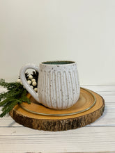 Load image into Gallery viewer, #029 - 16 oz. White speckled carved mug with green inside
