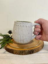 Load image into Gallery viewer, #029 - 16 oz. White speckled carved mug with green inside
