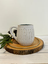 Load image into Gallery viewer, #031 - 18 oz. White speckled carved mug with blue inside
