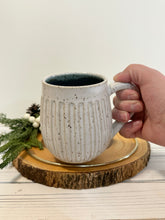 Load image into Gallery viewer, #031 - 18 oz. White speckled carved mug with blue inside
