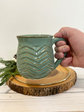 Load image into Gallery viewer, #033 - 16 oz. Green speckled carved mug
