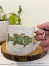 Load image into Gallery viewer, #002 - 14 oz. White speckled mug with large mouth bass (Copy)
