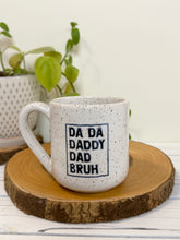 Load image into Gallery viewer, #003 - 14 oz. White speckled mug with dada, daddy, dad, bruh
