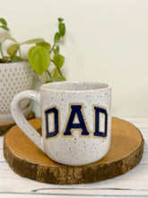 Load image into Gallery viewer, #005 - 16 oz. White speckled mug with blue DAD
