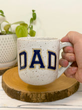 Load image into Gallery viewer, #005 - 16 oz. White speckled mug with blue DAD
