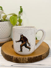 Load image into Gallery viewer, #008 - 16 oz. White speckled mug with Bigfoo t with a flannel and Beer *see notes
