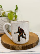 Load image into Gallery viewer, #008 - 16 oz. White speckled mug with Bigfoo t with a flannel and Beer *see notes
