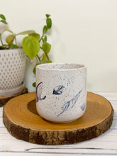 Load image into Gallery viewer, #018 - 14 oz. White speckled mug with whales and shells
