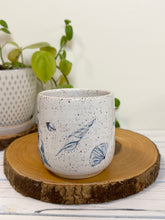 Load image into Gallery viewer, #021 - 16 oz. White speckled mug with whales and shells
