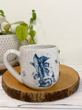 Load image into Gallery viewer, #021 - 16 oz. White speckled mug with whales and shells
