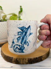 Load image into Gallery viewer, #022 - 16 oz. White speckled mug with whales and shells
