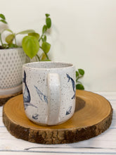 Load image into Gallery viewer, #023 - 16 oz. White speckled mug with whales and shells
