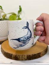 Load image into Gallery viewer, #023 - 16 oz. White speckled mug with whales and shells
