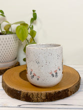 Load image into Gallery viewer, #026 - 16 oz. White speckled mug with snails
