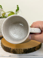 Load image into Gallery viewer, #030 - 16 oz. White speckled mug with gardening designs

