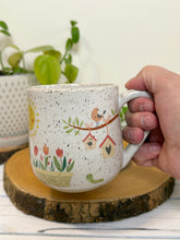 Load image into Gallery viewer, #031 - 16 oz. White speckled mug with gardening designs
