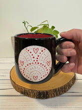 Load image into Gallery viewer, #007 - 14 oz. Black mug with heart pattern on Matte White. Red inside
