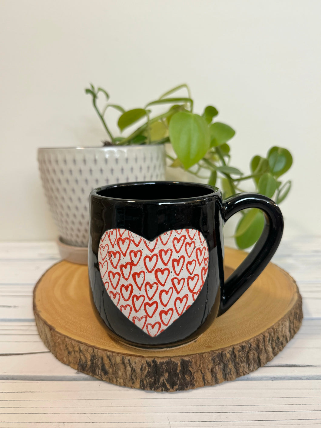 #009 - 14 oz. Black mug with heart pattern on Matte White