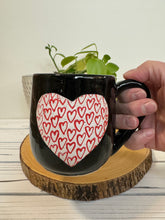 Load image into Gallery viewer, #009 - 14 oz. Black mug with heart pattern on Matte White
