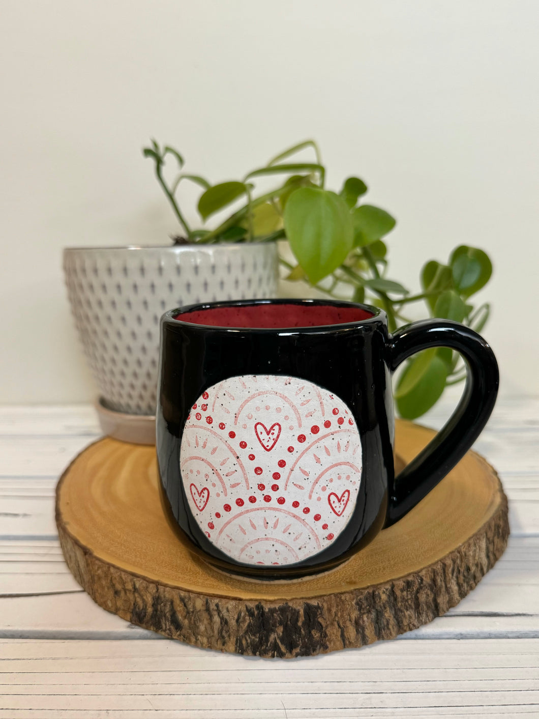 #008 - 16 oz. Black mug with heart pattern on Matte White. Red inside