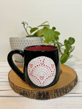 Load image into Gallery viewer, #008 - 16 oz. Black mug with heart pattern on Matte White. Red inside
