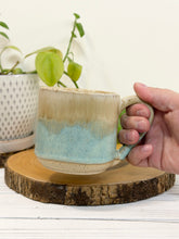 Load image into Gallery viewer, #013 - 12 oz. Beige and turquoise mug white inside
